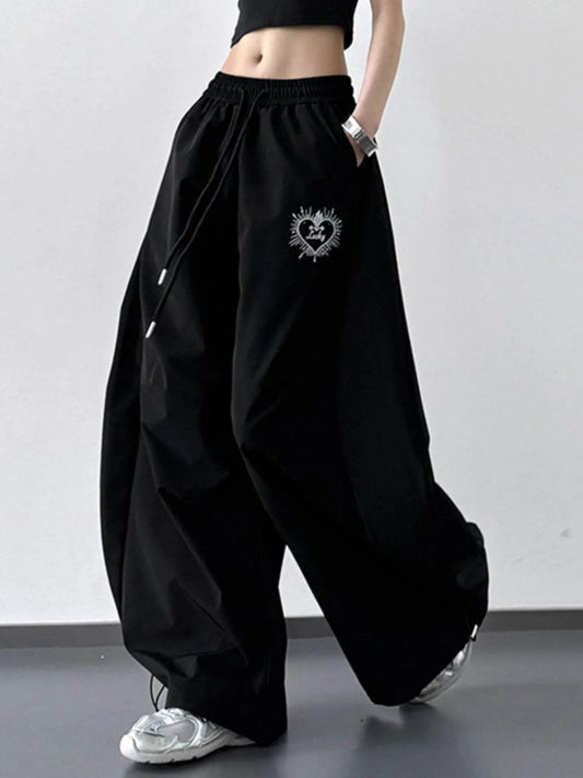 Wide Leg Drawstring Pants Black Trendsi 036e80af-a9e4-477d-85f6-d9f3e1f8050b-Max-Origin