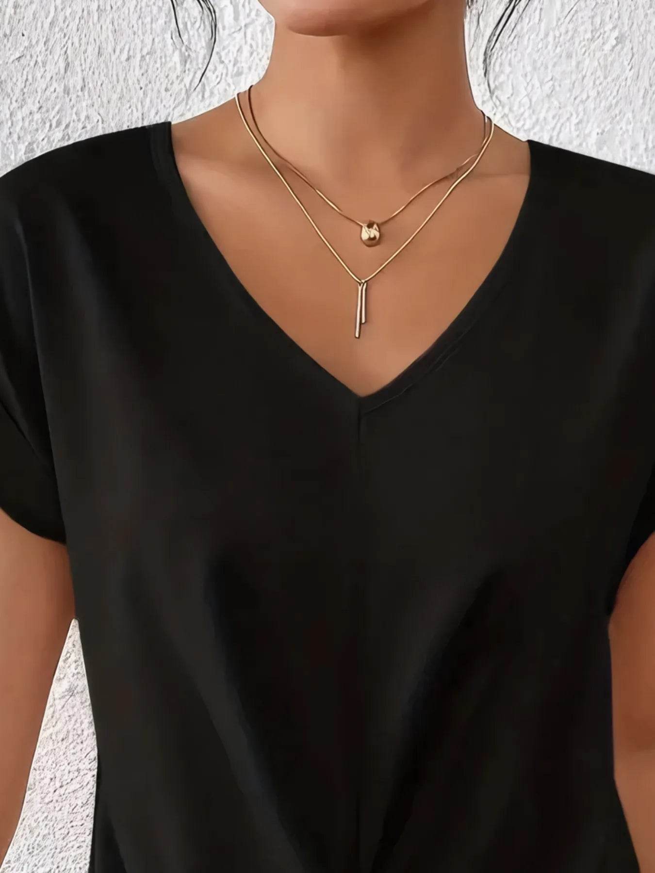 V-Neck Twist Front Top Trendsi 03887edc-e5a3-406e-89fd-1546354efd7f-Max-Origin
