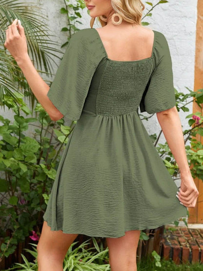 Smocked Back Knotted Flutter Sleeve Dress Trendsi 13a46673-a4c6-40b2-abed-fe6f5d673454-Max-Origin