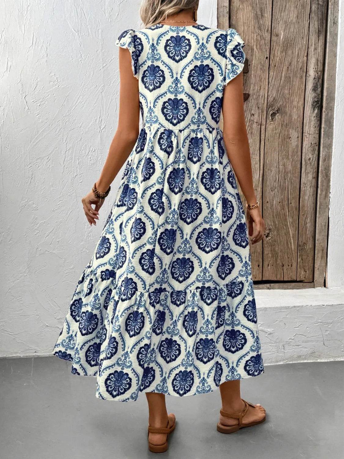 Printed V-Neck Cap Sleeve Dress Trendsi 15704018-7d3a-4a1a-9103-b4a936cb82d1-Max-Origin