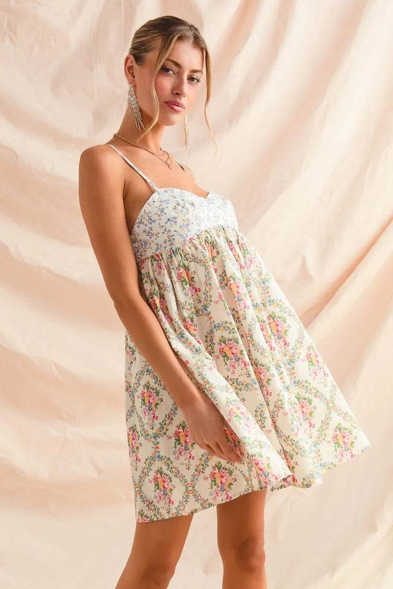 SO ME Mixed Floral Print Sleeveless Mini Dress Trendsi 160a68df78f047baa099c47c04570f1e-Max-Origin