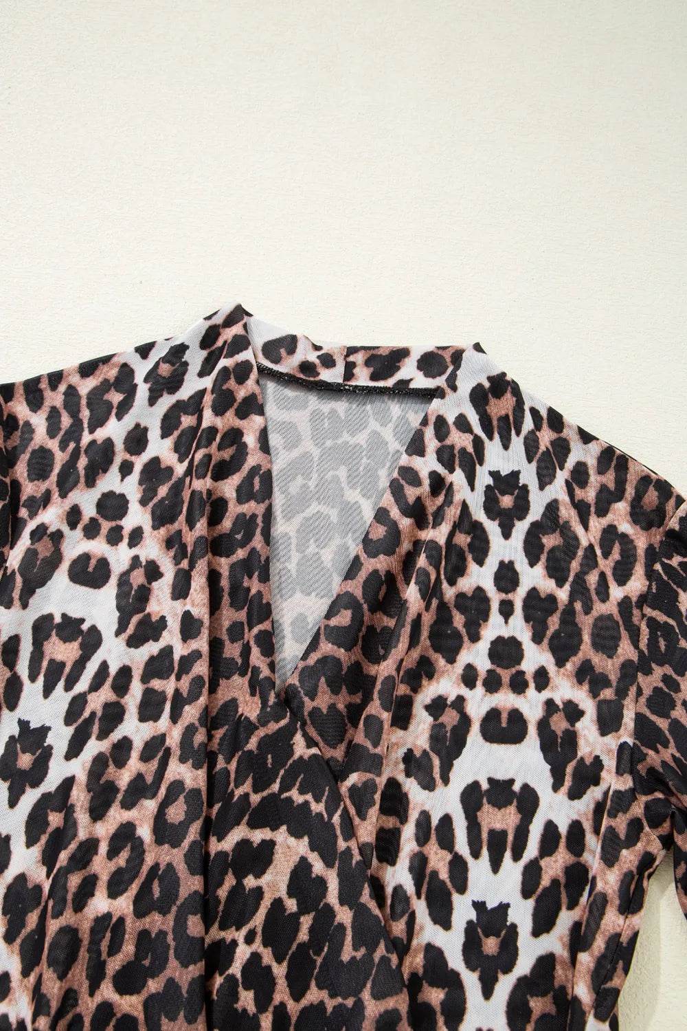 Leopard Wrapped V Neck Slim Short Sleeve Top Trendsi 1950ccf7-2c03-49ed-988a-ba4d2429b7c5-Max-Origin