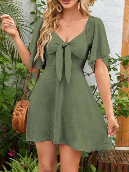 Smocked Back Knotted Flutter Sleeve Dress Trendsi 1e8cccb2-c2cd-4aa1-af38-33f9d0e0f96c-Max-Origin