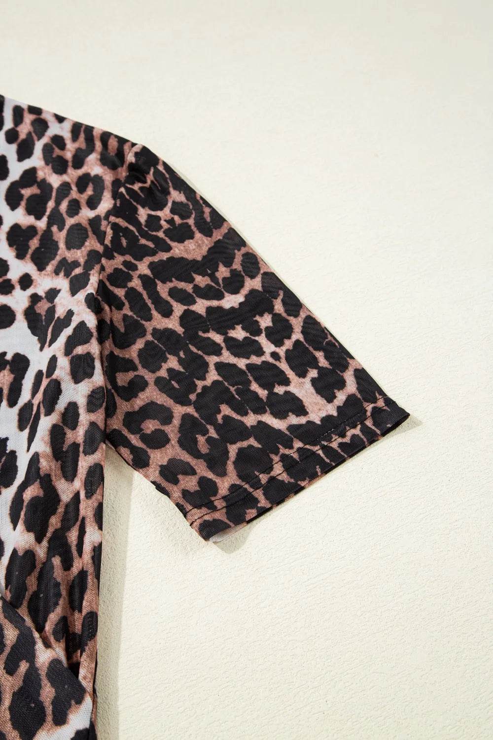 Leopard Wrapped V Neck Slim Short Sleeve Top Trendsi 21a21cdf-20d8-4348-b599-8e9f5ec724f4-Max-Origin