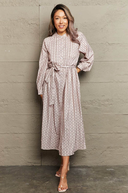 Perfee Printed Tie Waist Long Sleeve Dress Beige Trendsi 2599c59435ab4f039232257c597aea8d-Max