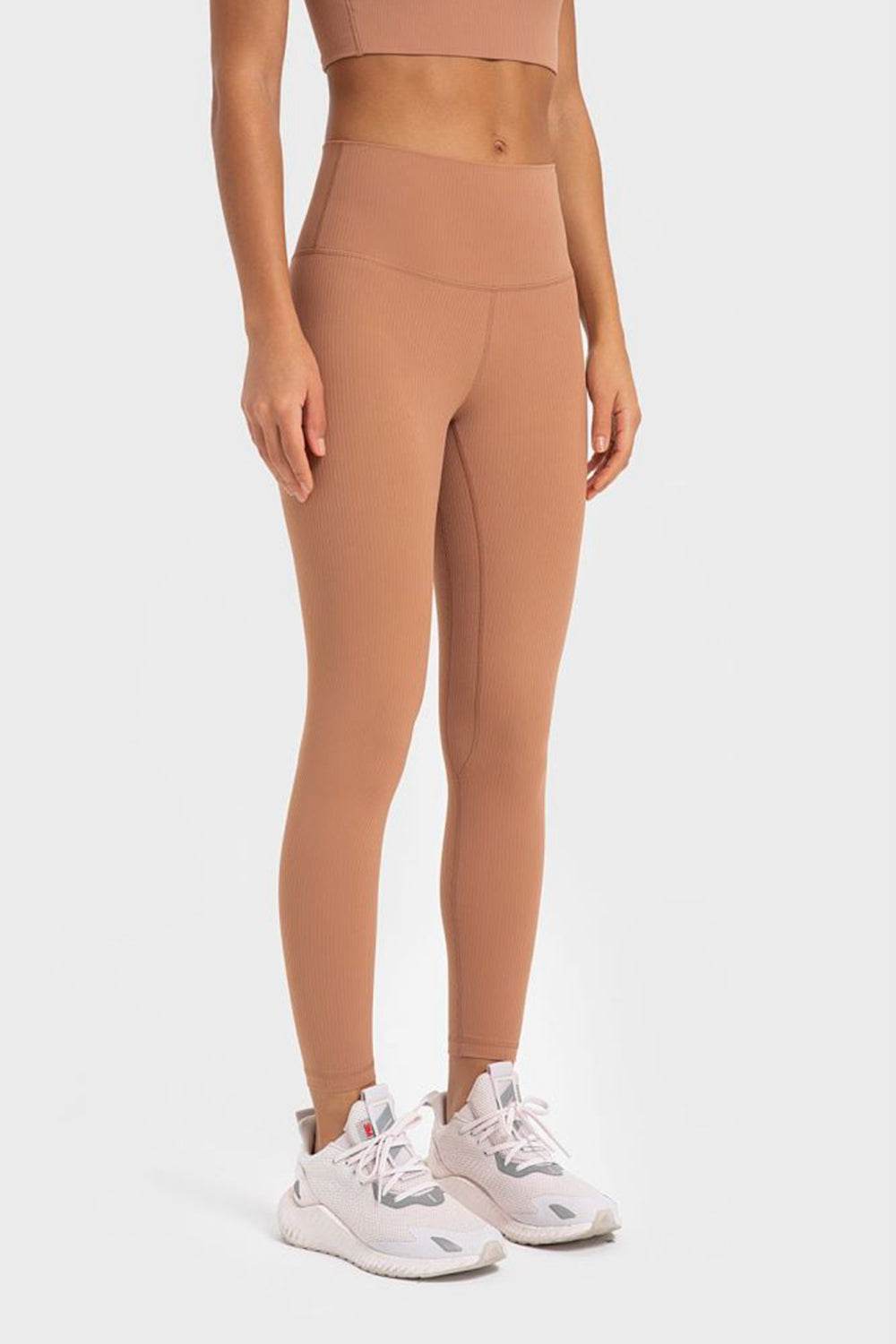 Millennia Highly Stretchy Wide Waistband Yoga Leggings Trendsi 25e9e437370e42cf9ff58be22dc9c4d3-Max