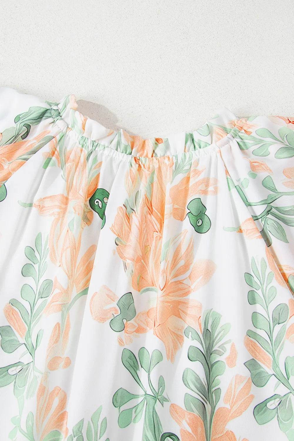 Floral Tie Neck Layered Short Sleeve Dress Trendsi 2769971e-6acd-44a5-bf3f-63f013b86519-Max-Origin