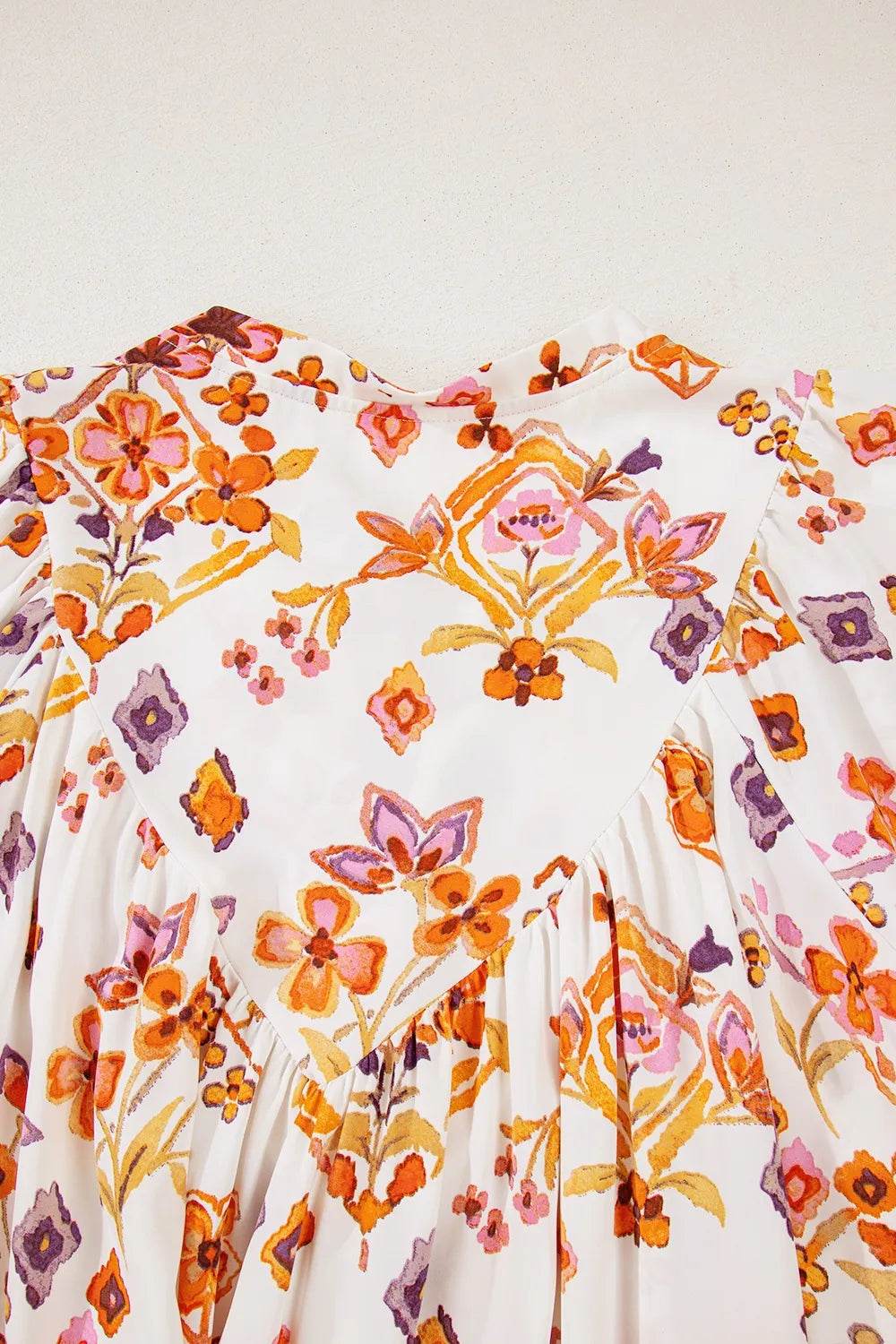 Printed Tie Neck Cap Sleeve Mini Dress Trendsi 284b7daf-1f72-419d-bdde-d30ae21dda55-Max-Origin
