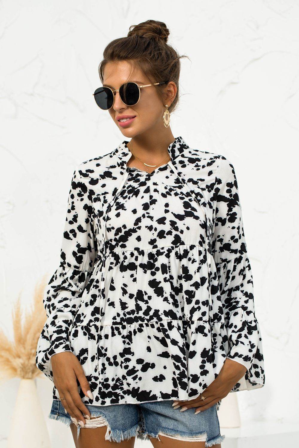 Printed Flare Sleeve Tie Neck Ruffle Trim Blouse Trendsi 28b0f4e55e6c4f6e8b9bbf84ca54a5c5-Max