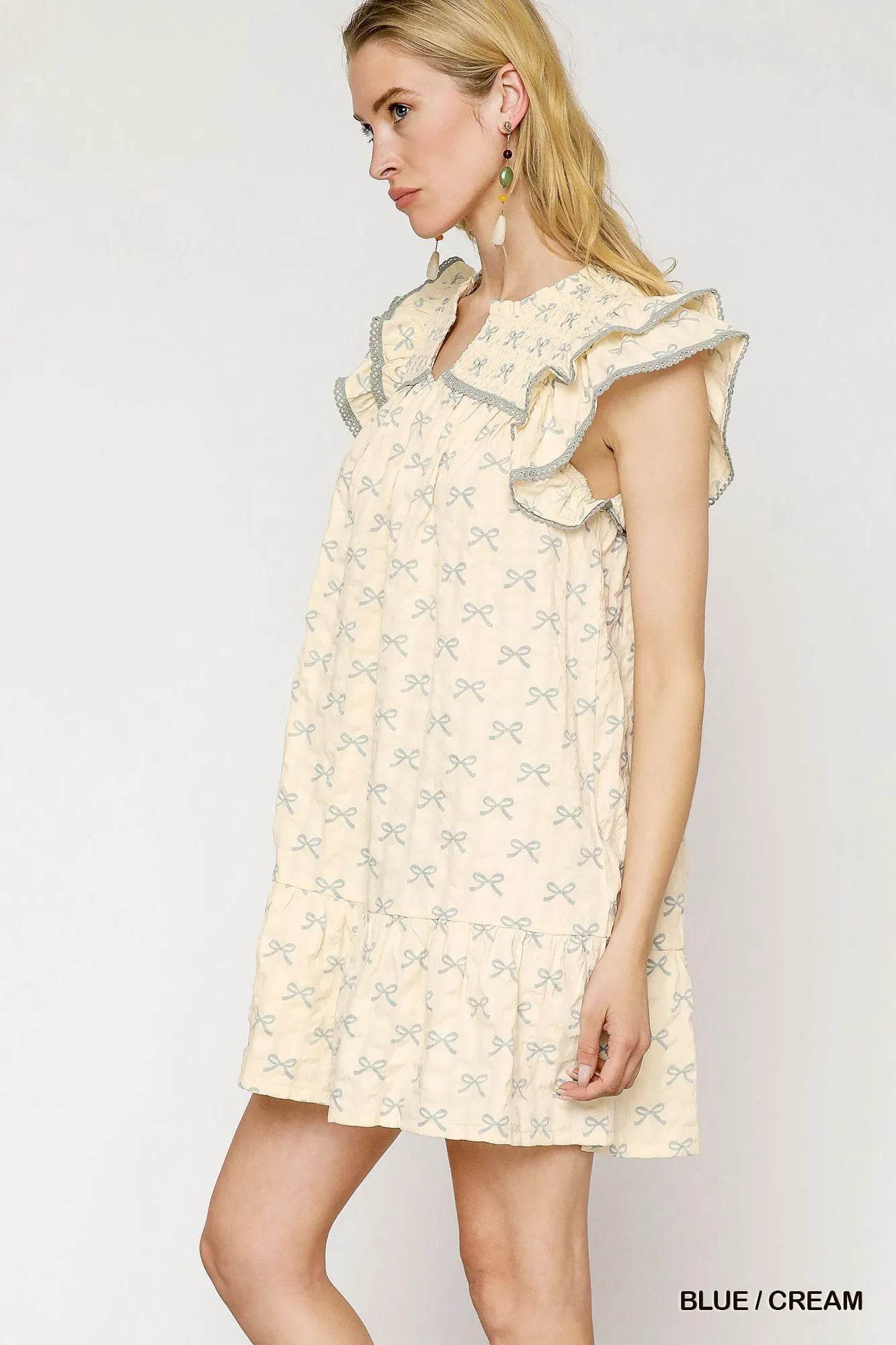 Umgee Bow Print Ruffled Cap Sleeve Mini Dress Trendsi 2d20222a-6f50-4097-98ea-8ab4d153f520-Max-Origin