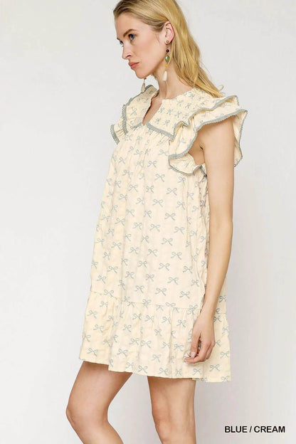 Umgee Bow Print Ruffled Cap Sleeve Mini Dress Trendsi 2d20222a-6f50-4097-98ea-8ab4d153f520-Max-Origin