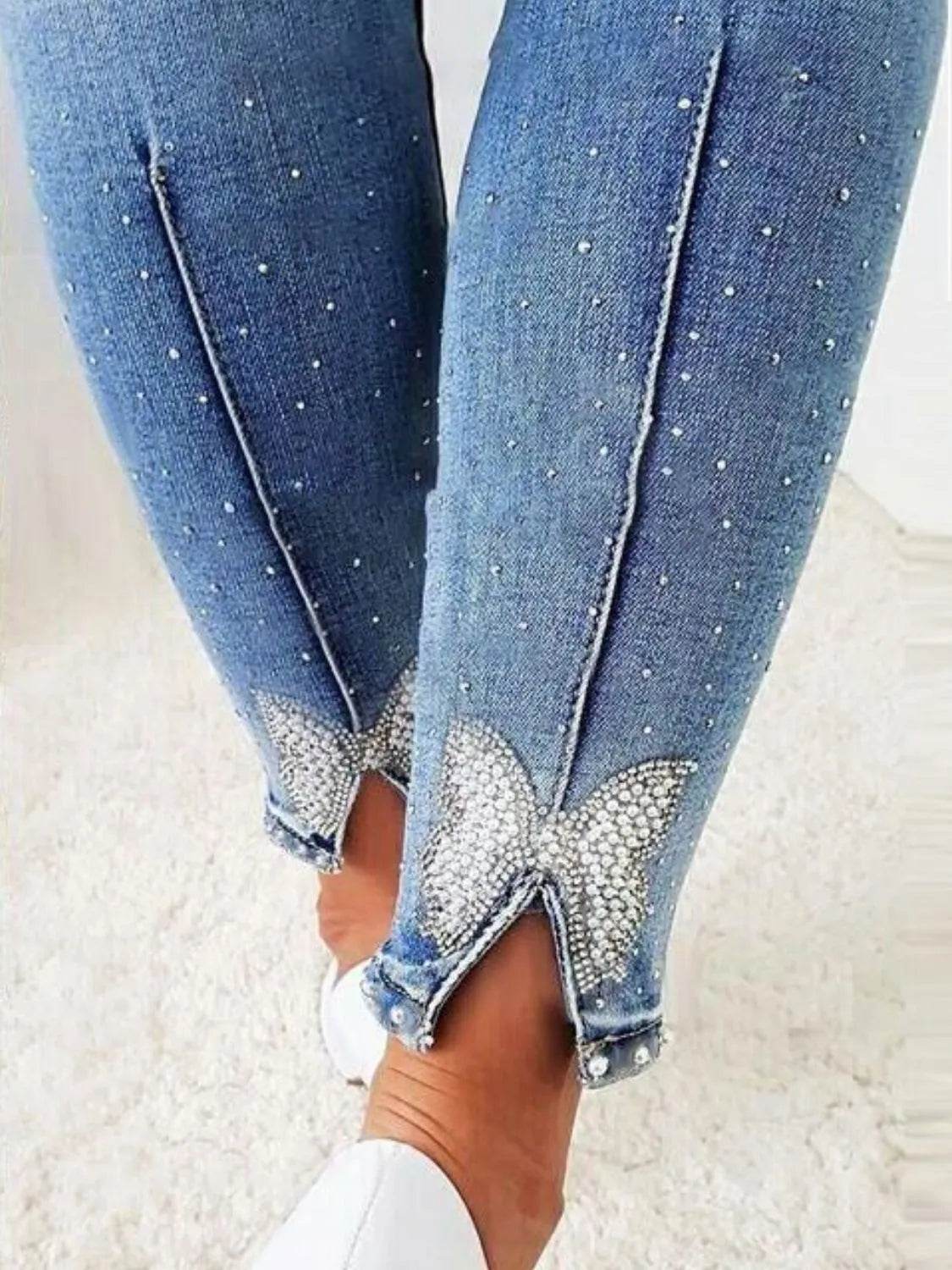 Rhinestone Butterfly Jeans with Pockets Trendsi 2f53cc5a-6b99-4b3e-9f7d-1920528a5db7-Max-Origin