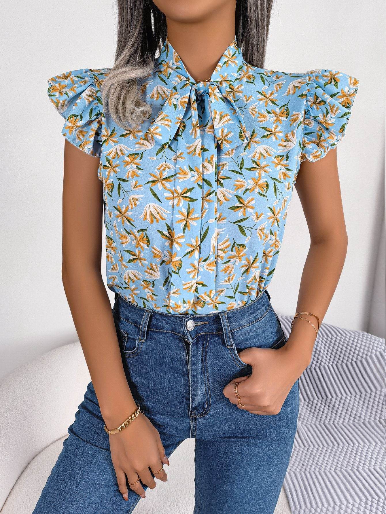 Floral Tie Neck Flutter Sleeve Blouse Trendsi 33d9ff1080614ea2ad4373eaf2f4f151-Max