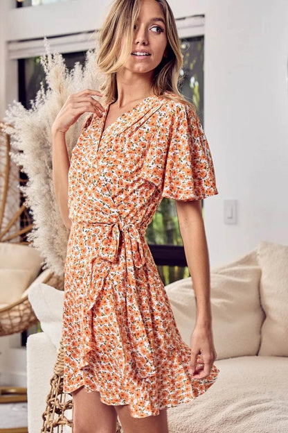 BiBi Floral Tied Short Sleeve Mini Wrap Dress Trendsi 3613cff7-efc3-46e6-a6e0-276c88a5900a-Max