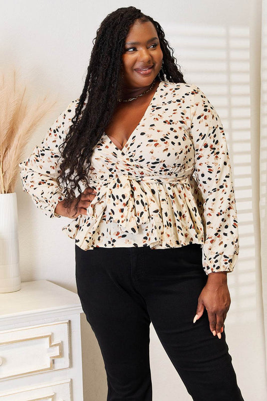 Honey Printed Tied Plunge Peplum Blouse Trendsi 368d068d51c9435b9fcdec418fb6943b-Max