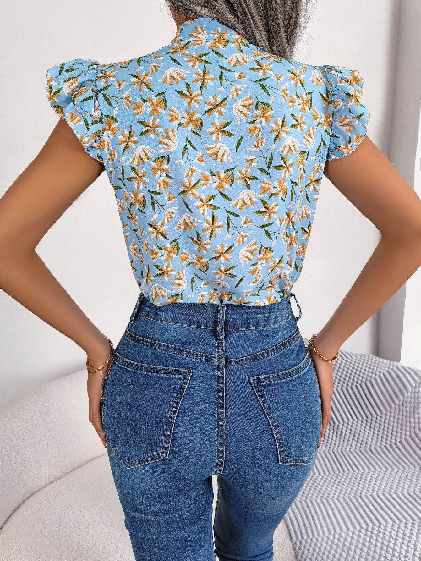 Floral Tie Neck Flutter Sleeve Blouse Trendsi 384301e3b5784a639381fabf8bf2acdf-Max