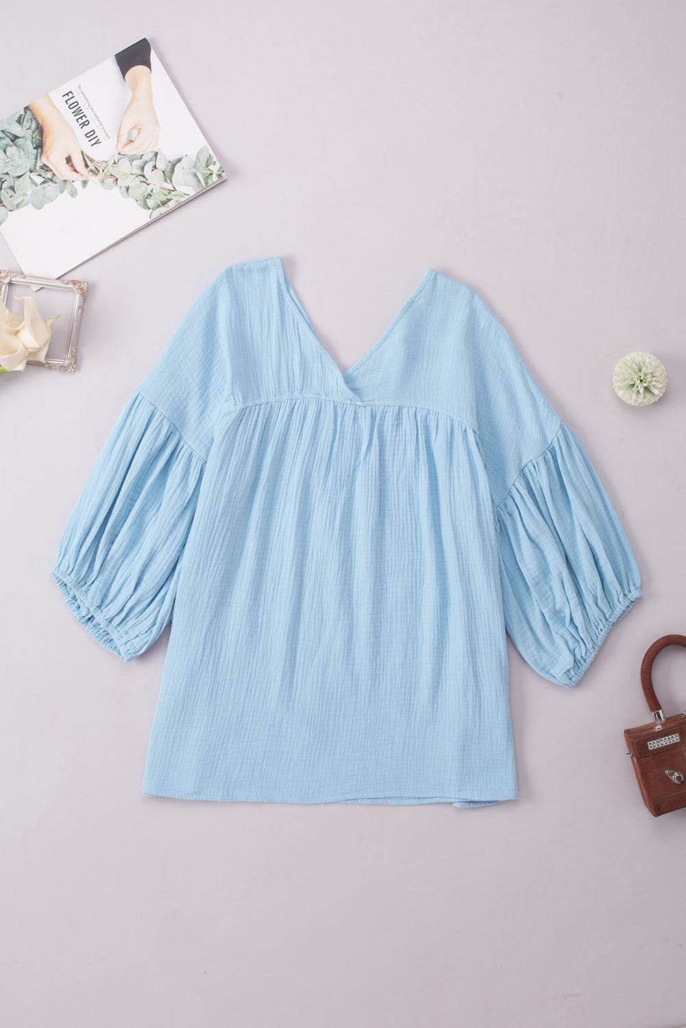 Dropped Shoulder V-Neck Blouse Trendsi 3ae6423a7c7147d0b1bc955c537f34d2-Max