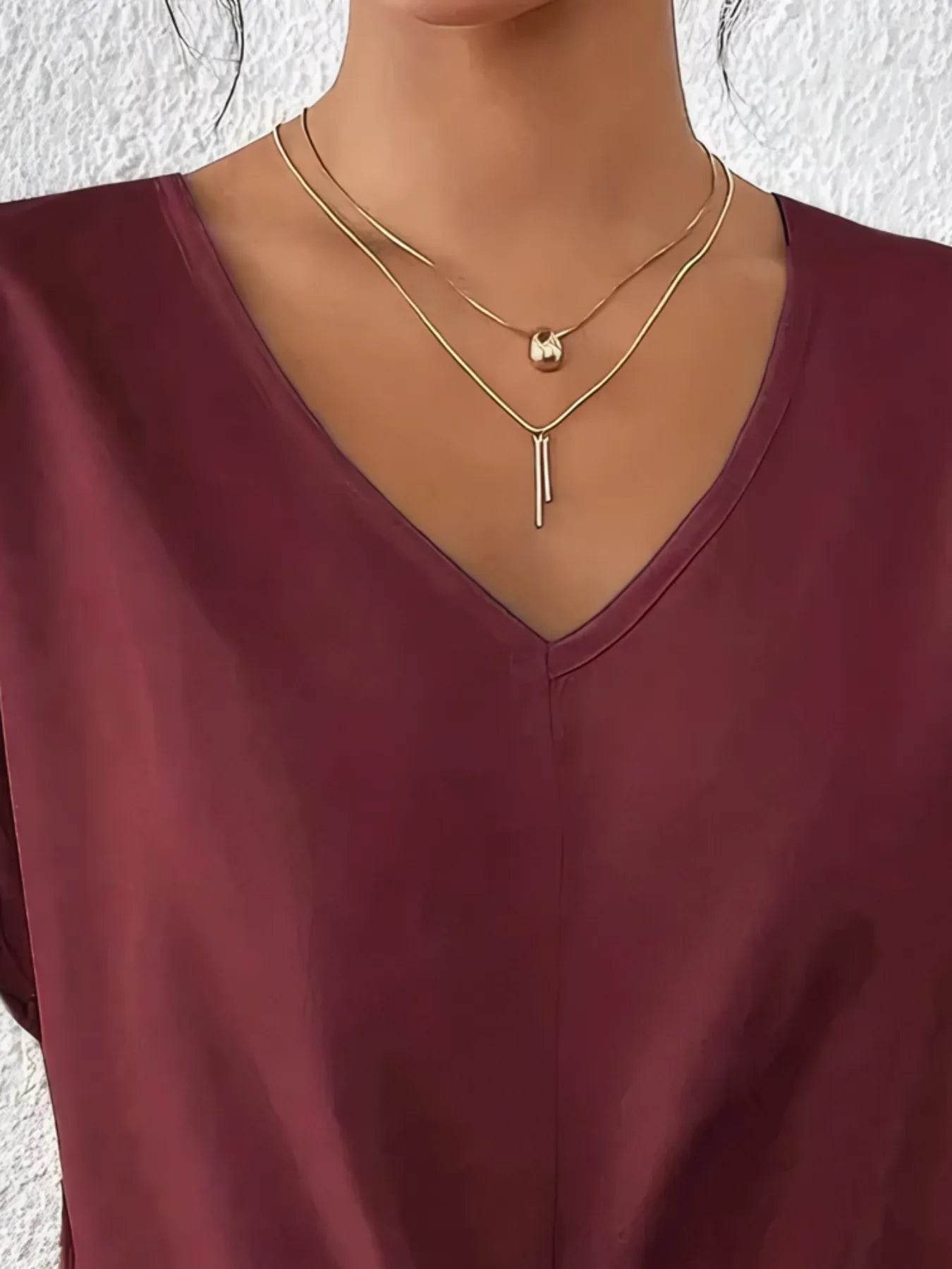 V-Neck Twist Front Top Trendsi 3b854702-4ec2-49c2-aa23-95ff080c8e76-Max-Origin