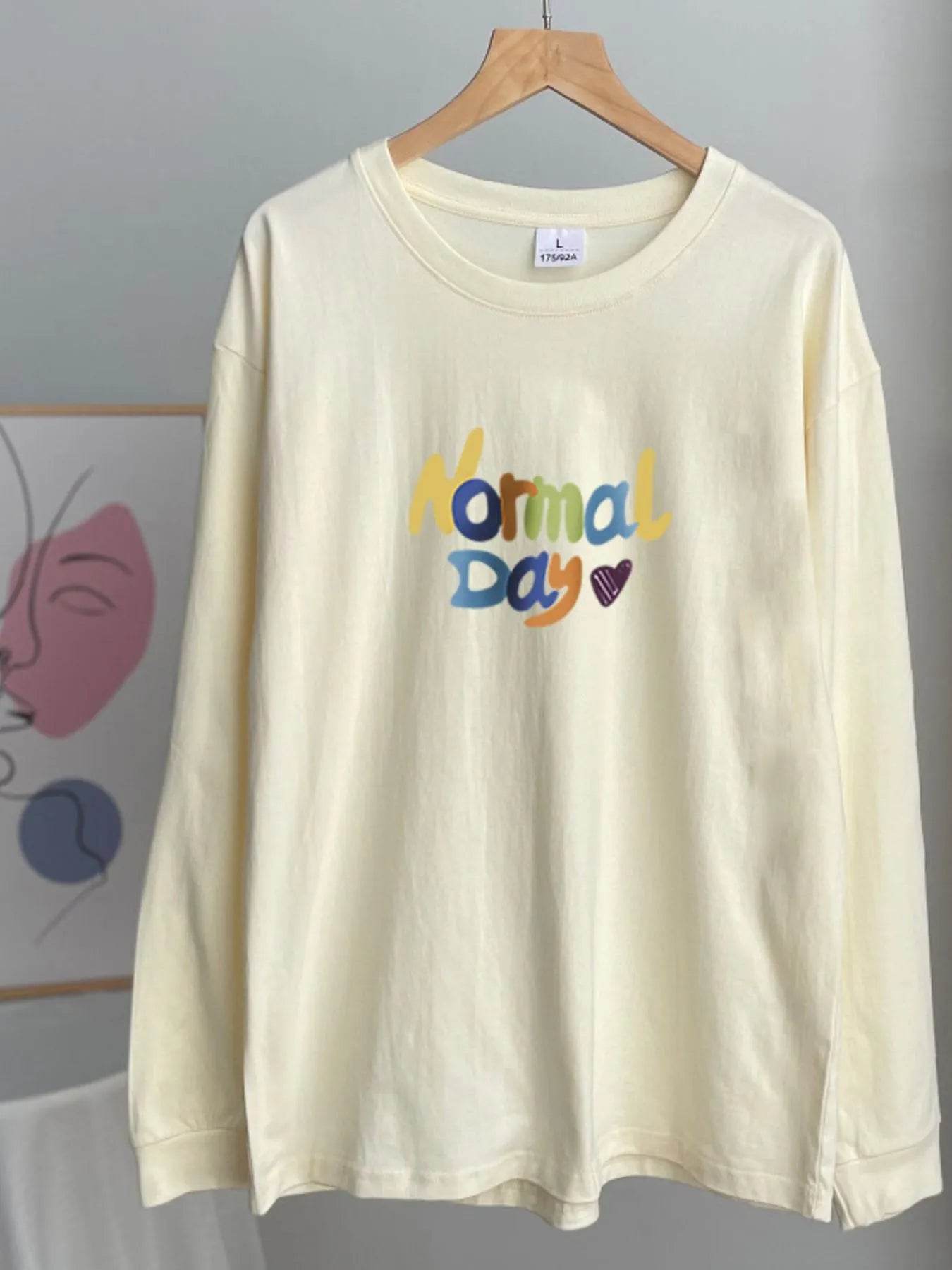 Normal Day Long Sleeve T-Shirt Light Yellow Trendsi 46fc6fb1-4ab5-44f8-be39-0307aca71000-Max-Origin