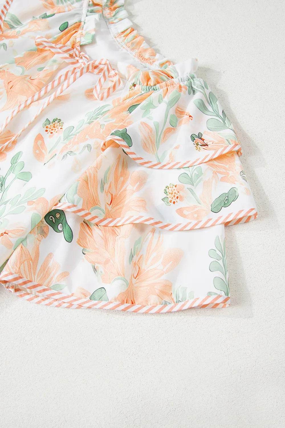 Floral Tie Neck Layered Short Sleeve Dress Trendsi 4f6500ef-3f7d-4871-b91a-6f6585fc8e4f-Max-Origin