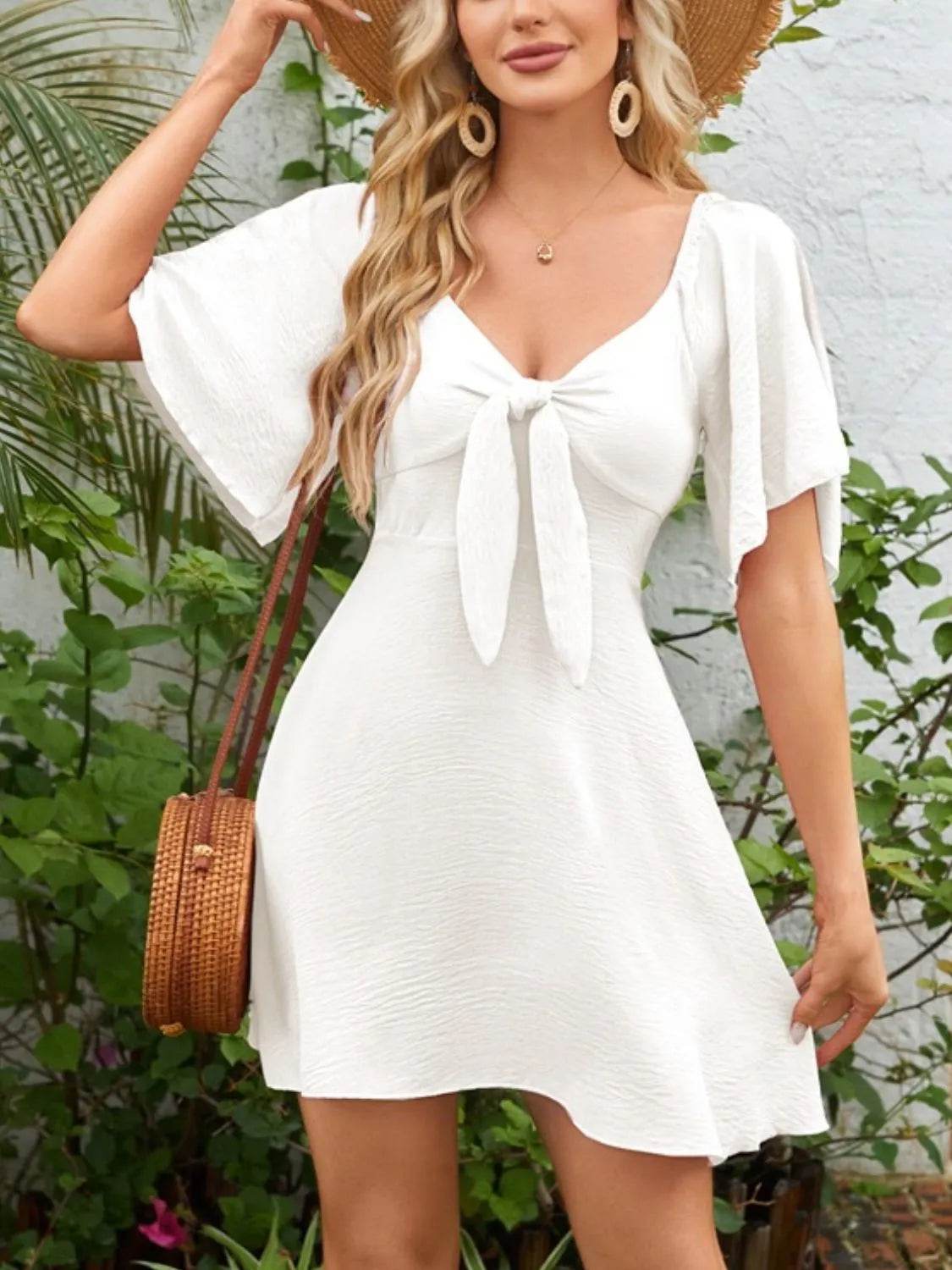 Smocked Back Knotted Flutter Sleeve Dress White Trendsi 51d78842-09a0-4040-8a75-be012dc50d70-Max-Origin