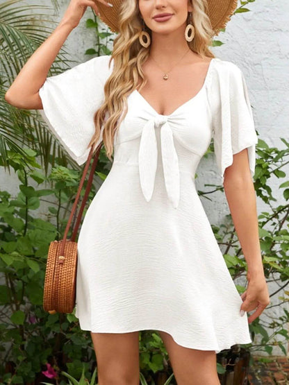 Smocked Back Knotted Flutter Sleeve Dress White Trendsi 51d78842-09a0-4040-8a75-be012dc50d70-Max-Origin