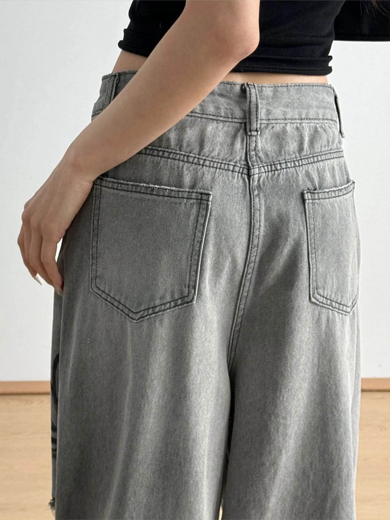 Printed Distressed Wide Leg Jeans Trendsi 5403f7c9-5d25-42bc-b24f-21656b885840-Max-Origin
