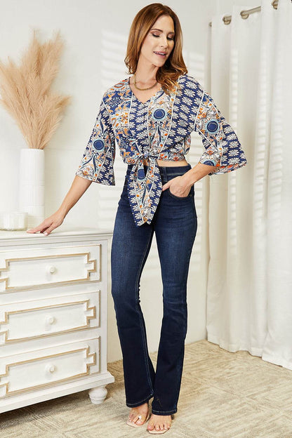 Tie Hem V-Neck Three-Quarter Sleeve Blouse Trendsi 5ee80e12f27749cd9107efd877aceda3-Max