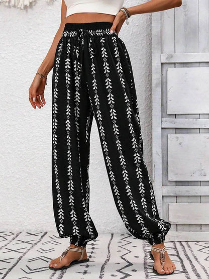 Tied Printed High Waist Pants Trendsi 6a46a452-5f13-4541-8e2d-696b0d221b2a-Max