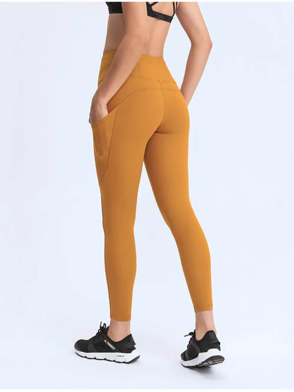 Millennia Wide Waistband Leggings with Pockets Trendsi 72eea259688848e8bf83b8c7758d3b87-Max