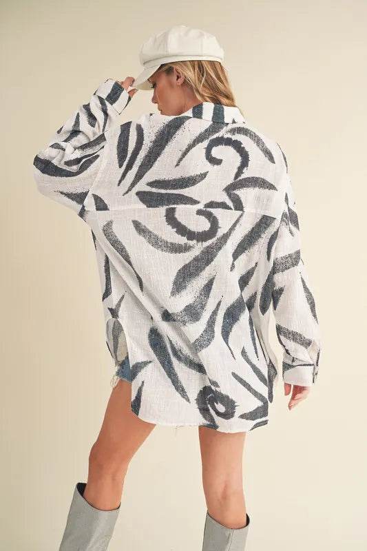 Aemi + Co High-Low Printed Button Up Long Sleeve Shirt Trendsi 73584c22-ea50-4faa-b3f1-e5881cadfc18-Max