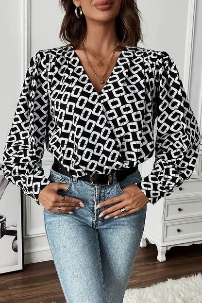 Perfee Geometric V-Neck Long Sleeve Blouse Trendsi 74bdc22022984001884a68b91f1d5d18-Max