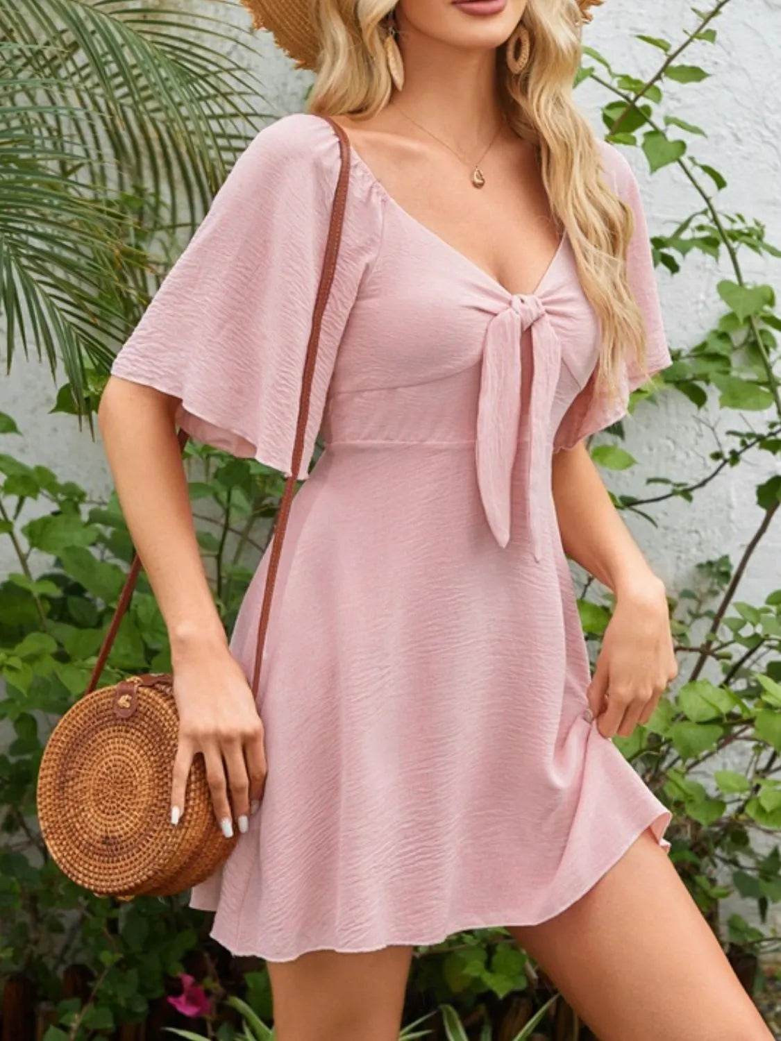 Smocked Back Knotted Flutter Sleeve Dress Trendsi 808c442f-4d51-47af-bf73-838cc8f9c871-Max-Origin