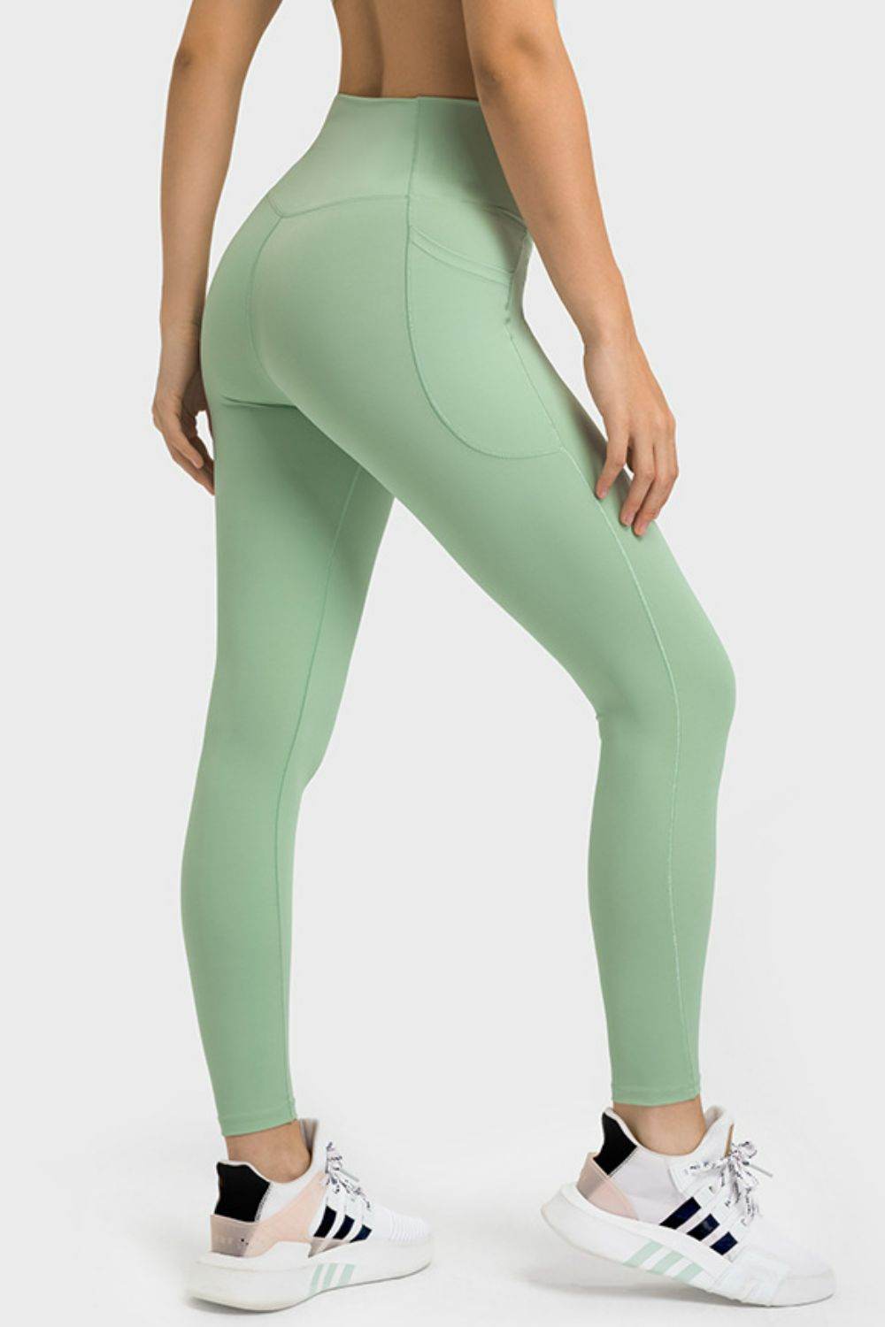 Millennia V-Waist Yoga Leggings with Pockets Trendsi 835b4d75d7344f50bc803d4ad397ce6c-Max