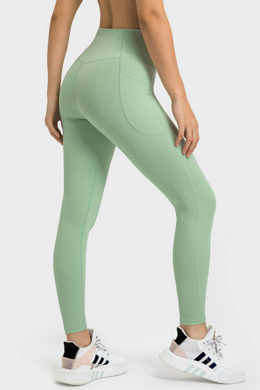 Millennia V-Waist Yoga Leggings with Pockets Trendsi 835b4d75d7344f50bc803d4ad397ce6c-Max