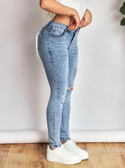 Distressed Skinny Jeans with Bow Back Trendsi 89845873-e6ed-4b18-9ebb-ce5b2fba0ffa-Max-Origin