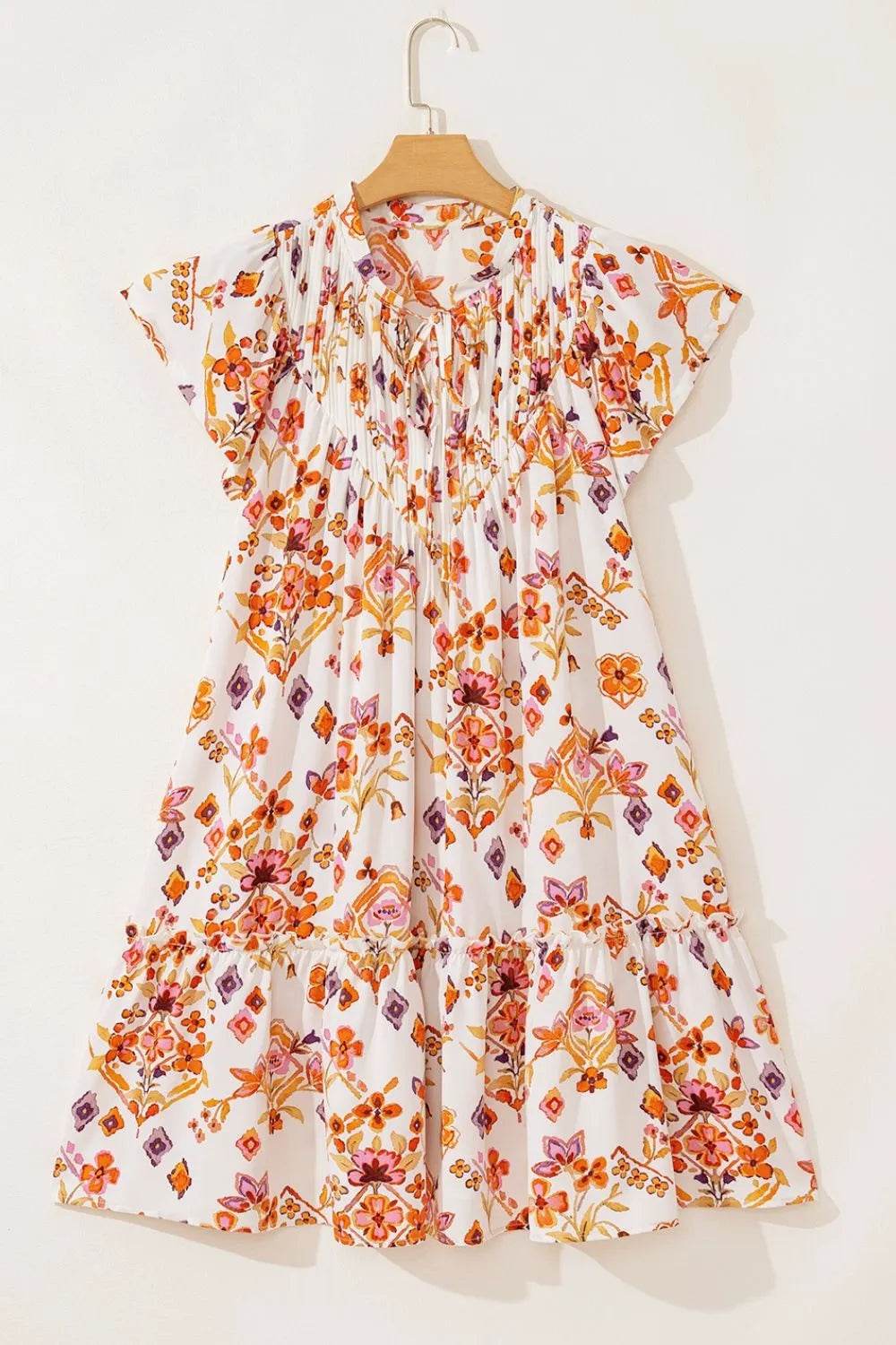 Printed Tie Neck Cap Sleeve Mini Dress Trendsi 8d50b04e-27fe-4d95-a52c-35bf682ce053-Max-Origin