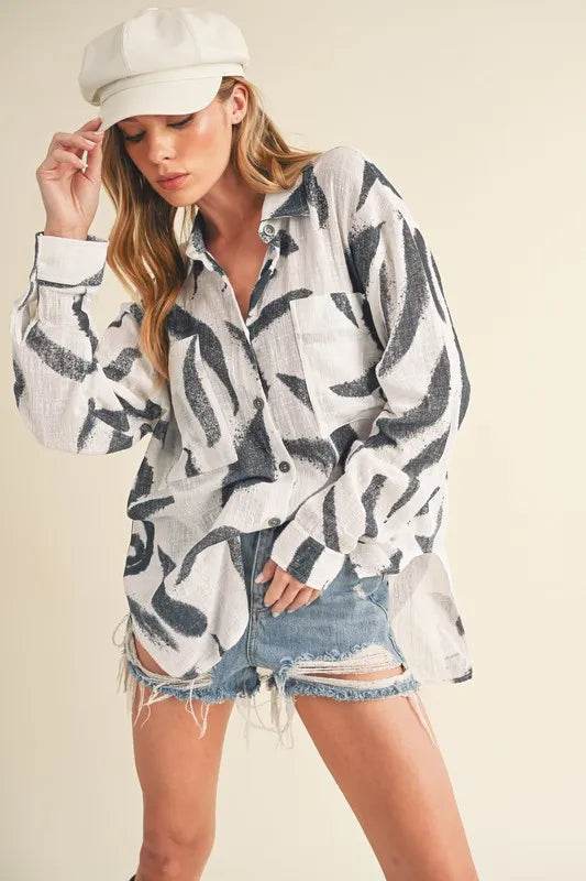 Aemi + Co High-Low Printed Button Up Long Sleeve Shirt Trendsi 95ceb0ce-af22-481d-b4ce-a037ad637501-Max
