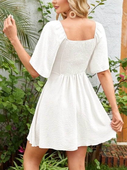 Smocked Back Knotted Flutter Sleeve Dress Trendsi 96ed11ea-d214-4673-960c-f78eb943e9f5-Max-Origin