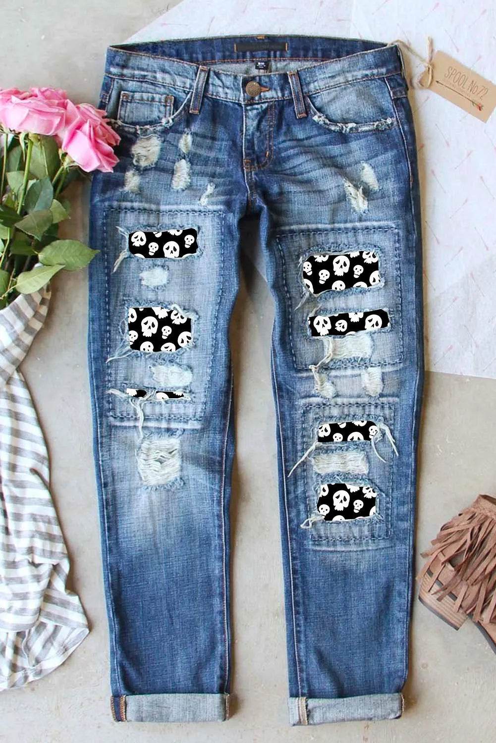 Distressed Skeleton Pattern Jeans with Pockets Medium Trendsi 9904122d-d415-45e5-a5b9-5246a8e22453-Max
