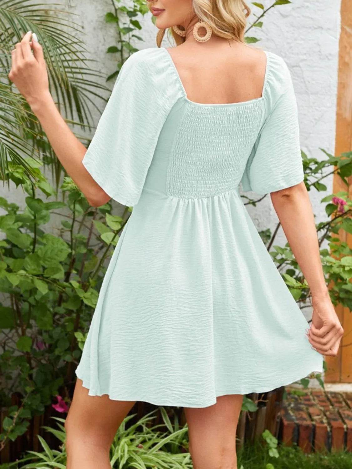 Smocked Back Knotted Flutter Sleeve Dress Trendsi a3d36d94-7956-41ff-8ff3-043e8fc7731f-Max-Origin