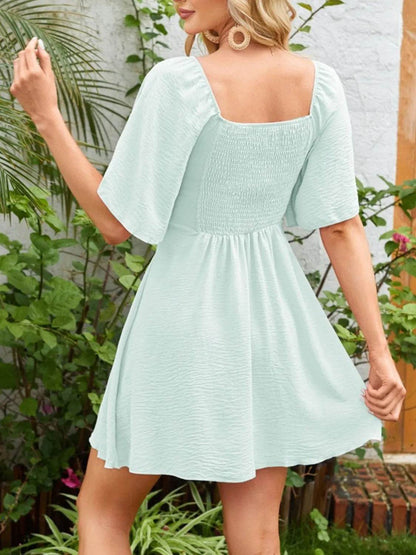 Smocked Back Knotted Flutter Sleeve Dress Trendsi a3d36d94-7956-41ff-8ff3-043e8fc7731f-Max-Origin