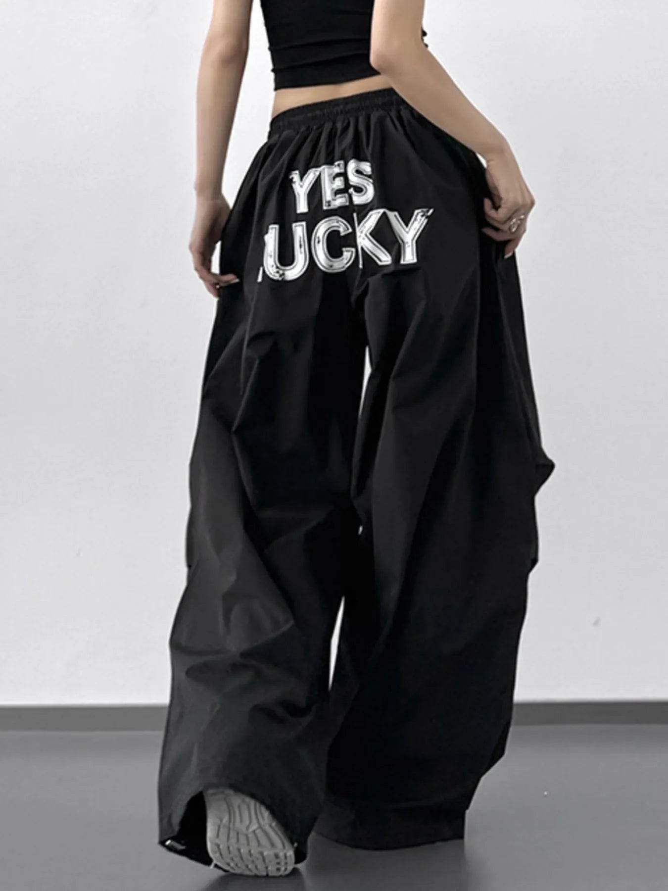 Letter Back Wide Leg Drawstring Pants Black Trendsi a8248e51-4407-43bd-938d-2a013d5adc54-Max-Origin