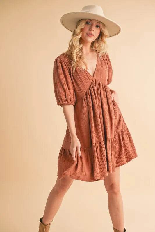 Aemi+Co Tied Back Ruffled Short Sleeve Mini Dress Trendsi b18f049b4a094a27be776193c09eda21-Max-Origin