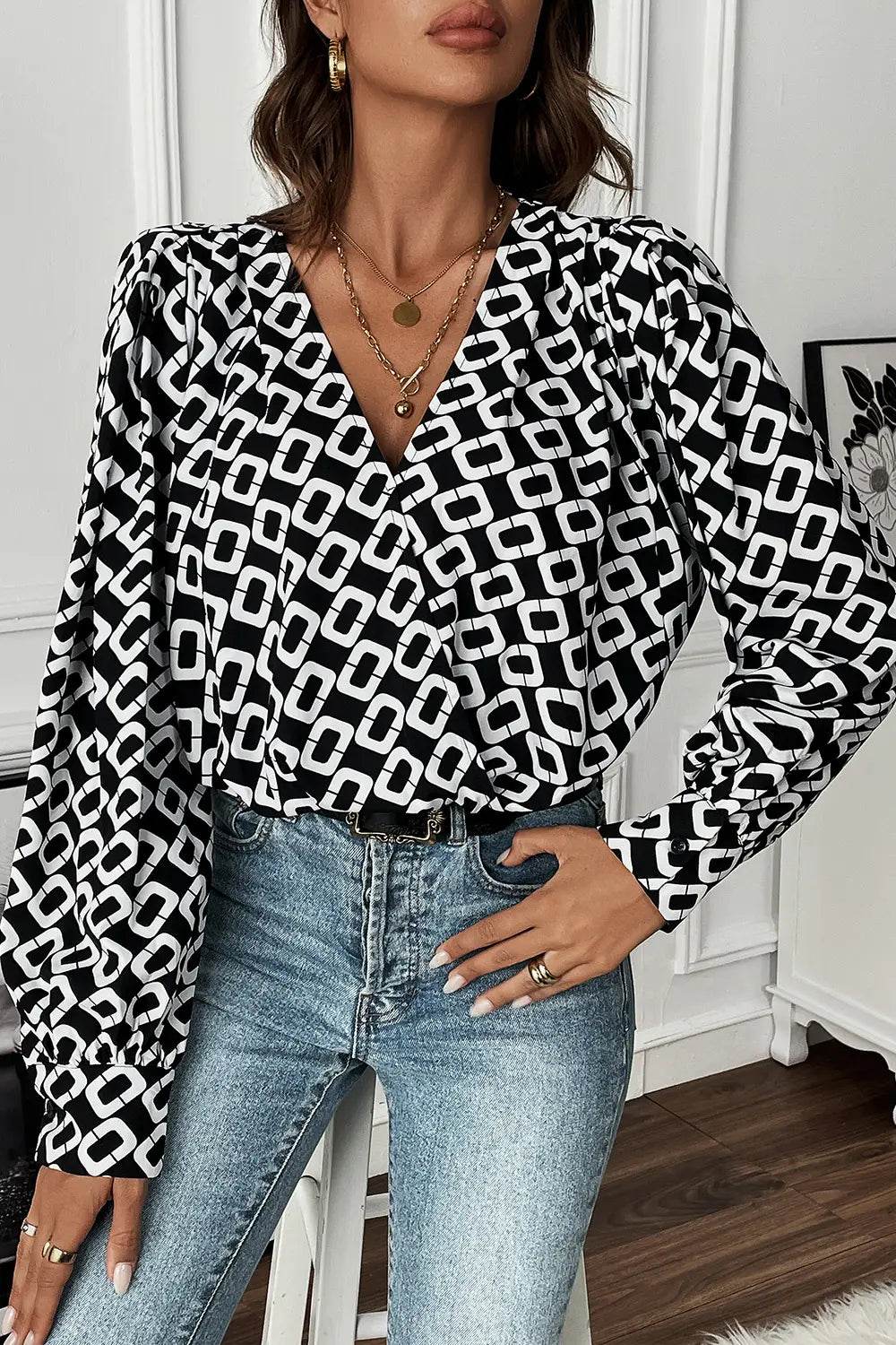 Perfee Geometric V-Neck Long Sleeve Blouse Trendsi b2ea354c2988456c9e6d5b70ebfa42f4-Max