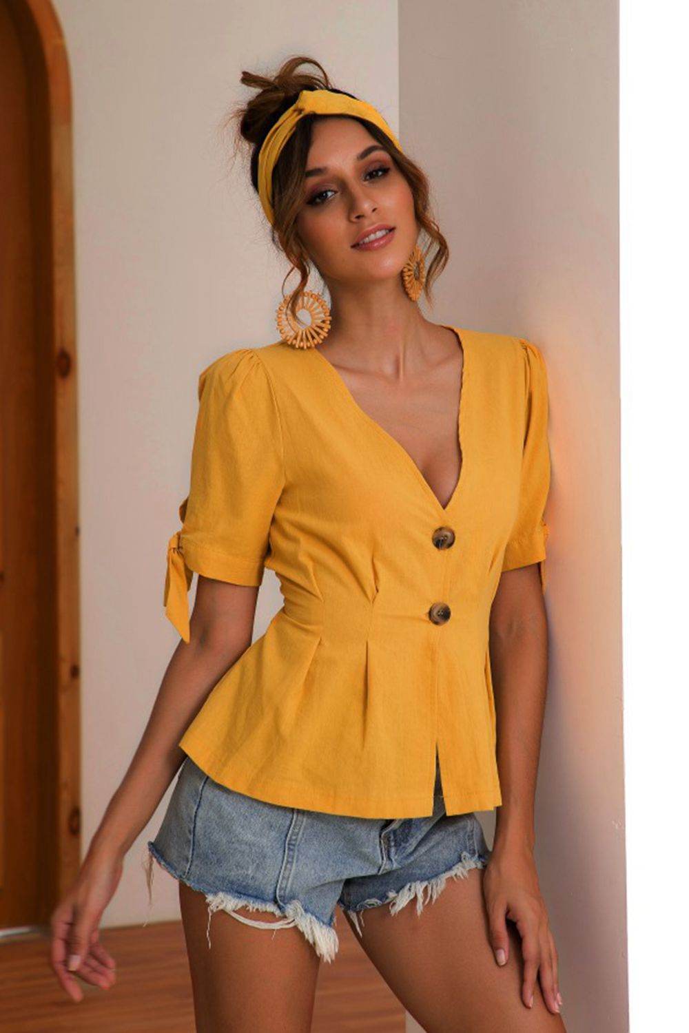 Buttoned V-Neck Short Sleeve Blouse Trendsi b578f457b4594aedba87f2fdd79890cd-Max