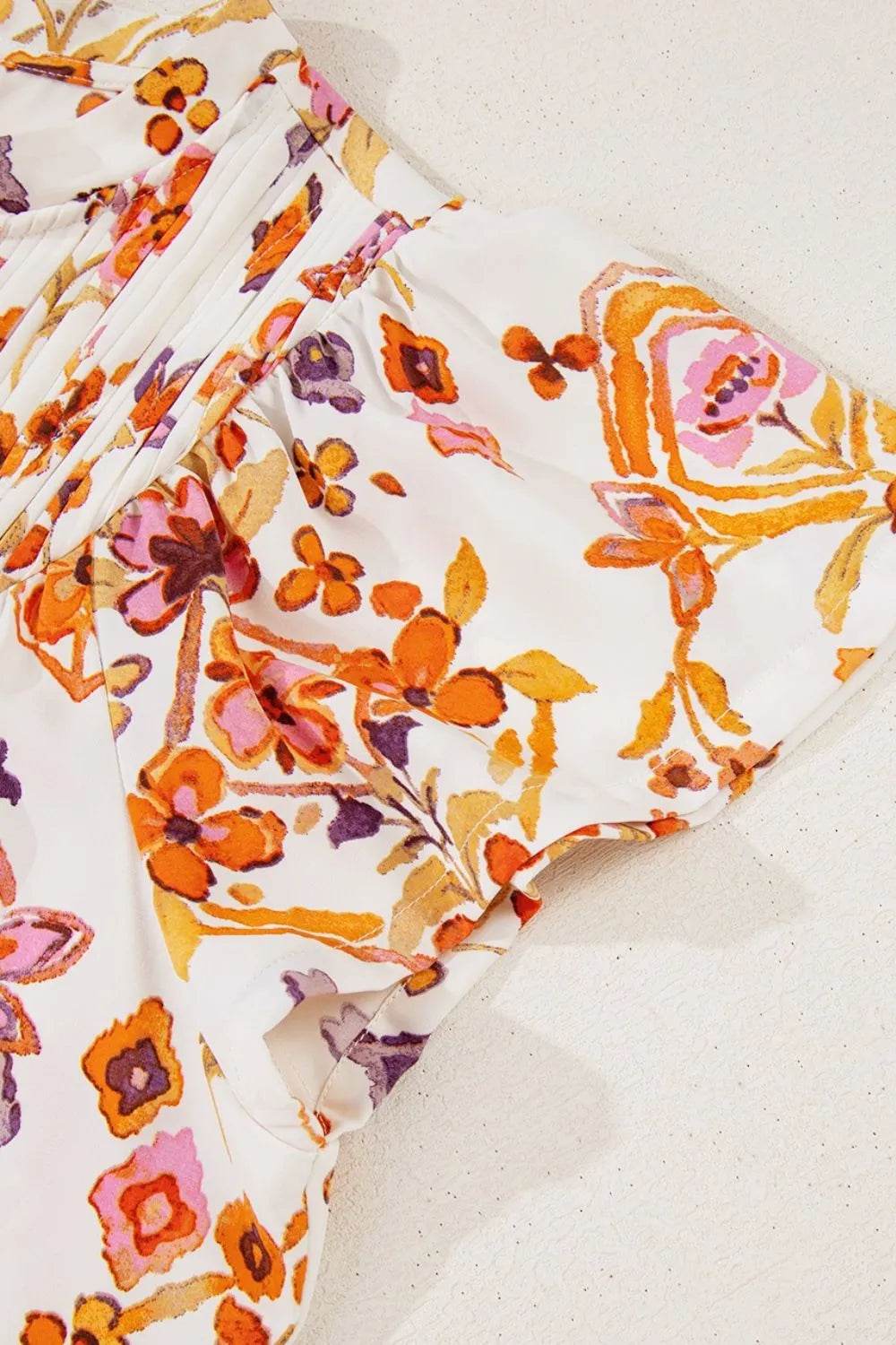 Printed Tie Neck Cap Sleeve Mini Dress Trendsi bd69d581-3826-4e83-ba36-027e8e767e5b-Max-Origin
