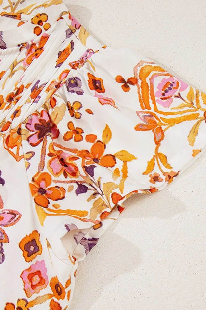 Printed Tie Neck Cap Sleeve Mini Dress Trendsi bd69d581-3826-4e83-ba36-027e8e767e5b-Max-Origin