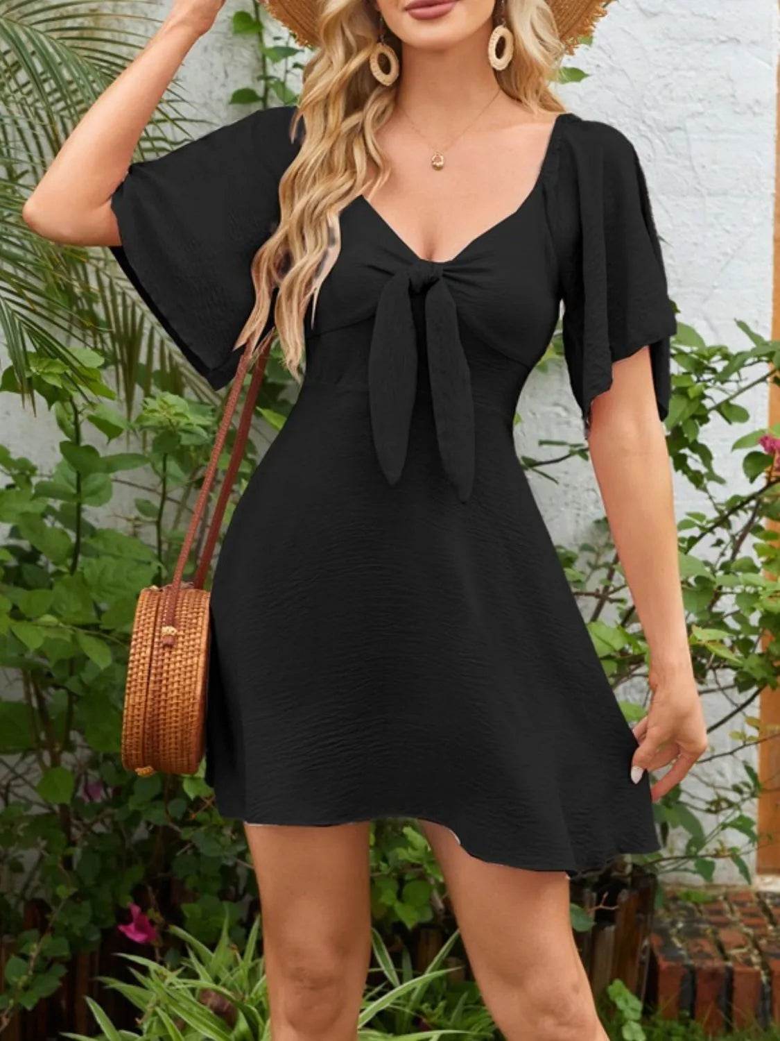 Smocked Back Knotted Flutter Sleeve Dress Trendsi c19eb303-c4ac-407d-bb42-357e68b708cd-Max-Origin