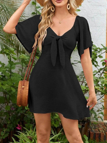 Smocked Back Knotted Flutter Sleeve Dress Trendsi c19eb303-c4ac-407d-bb42-357e68b708cd-Max-Origin